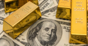 gold bars and USD